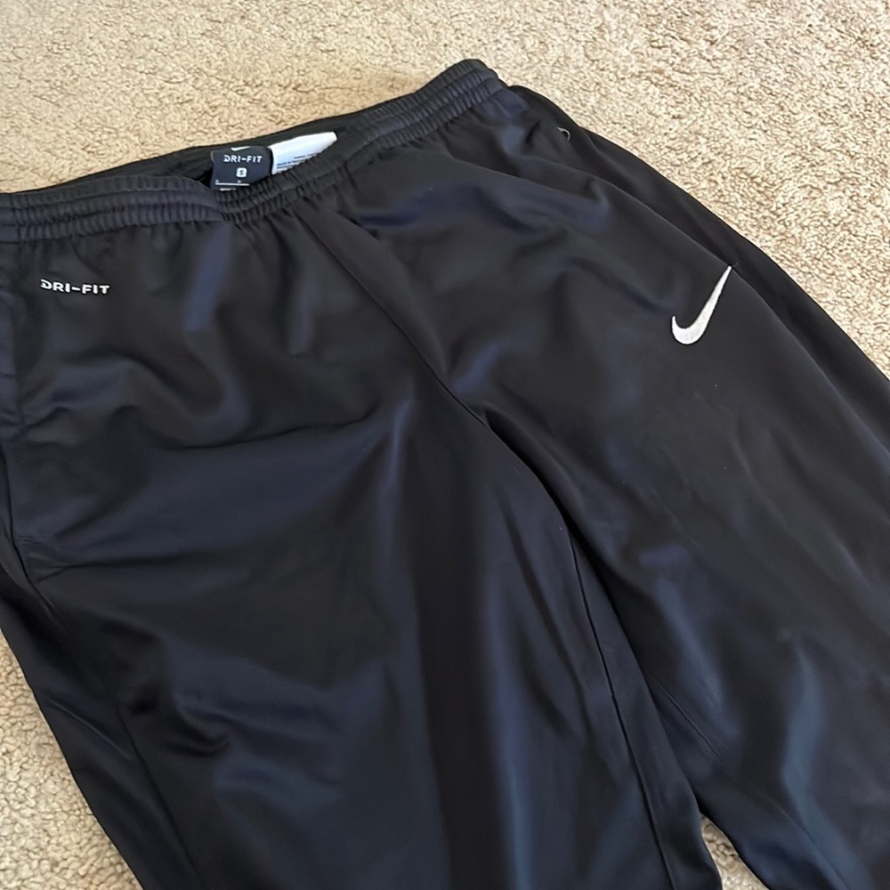 Brand new Nike dry fit women’s athletic zip pants